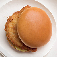 An overhead photograph of a toasted, buttery white bun