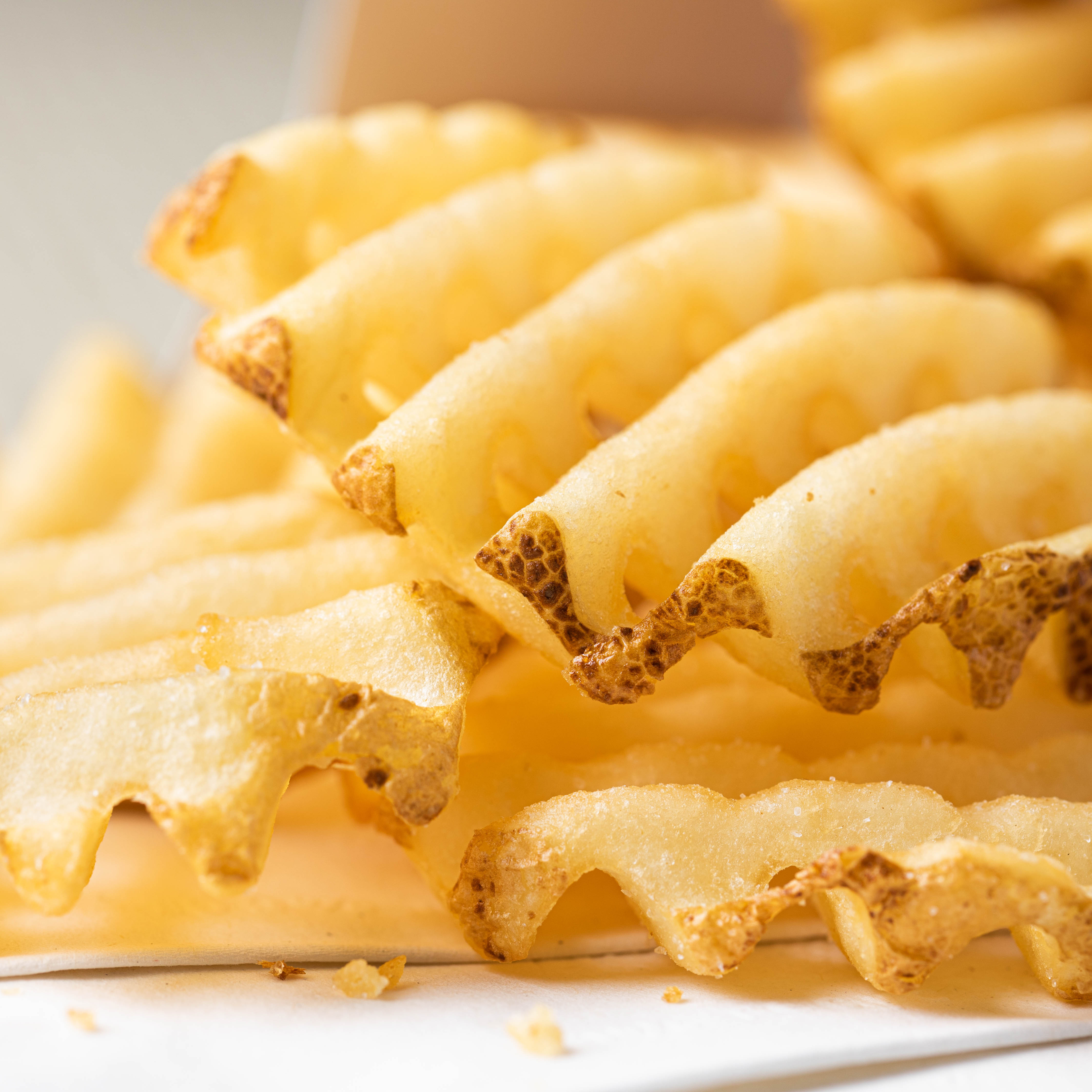 Close up of waffle potato fries