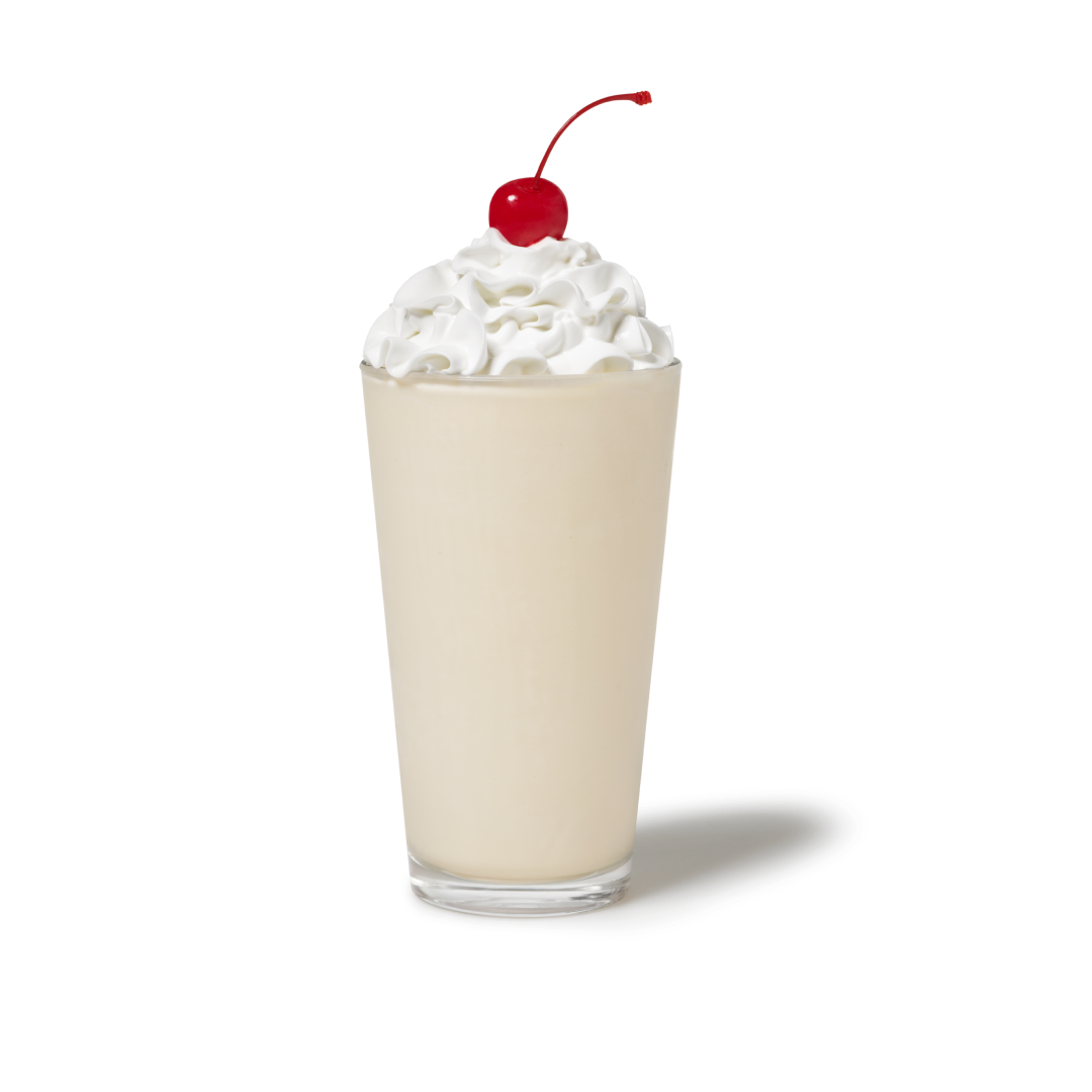 Vanilla Milkshake with whipped cream and a cherry on top in a cup, with NUTRIGRADE of 'D' at 19% sugar